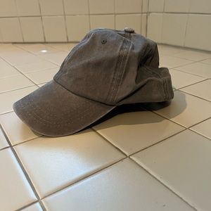 Gray high ponytail/messy bun baseball cap